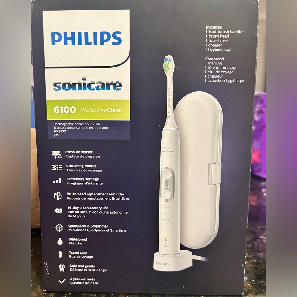 Toothbrush - never opened, box does have a cut from opening the shipping box.
